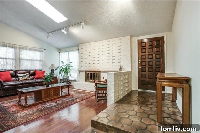 Inviting Living Room with Vaulted Ceilings and Fireplace at 3714 Crown Shore Dr