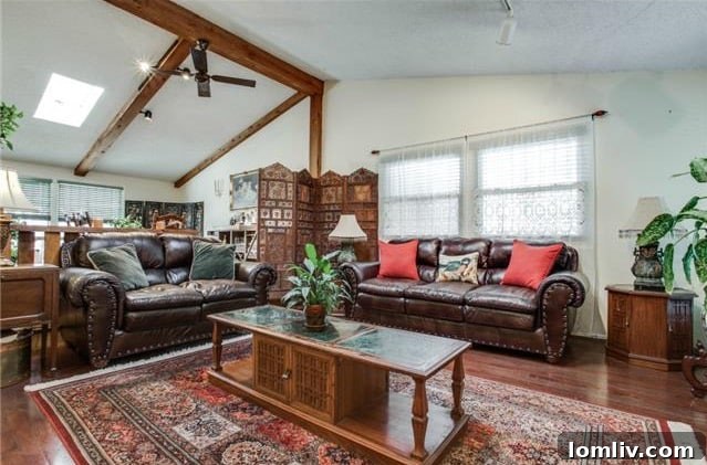 View from Living Room towards Dining Area showcasing Wood Beams