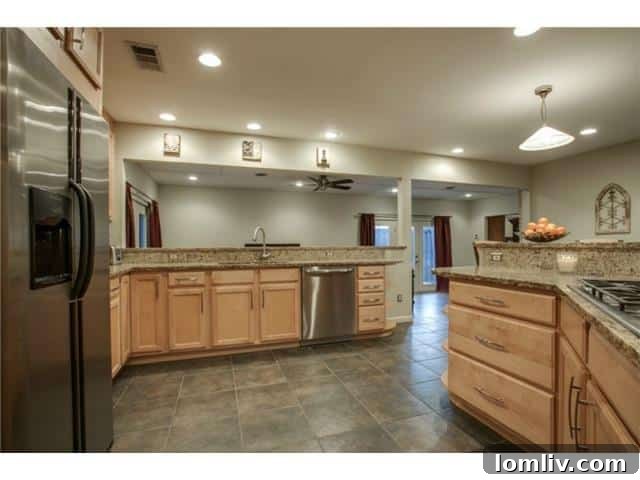 Expansive Kitchen Island and Breakfast Bar in 10469 Coleridge Street