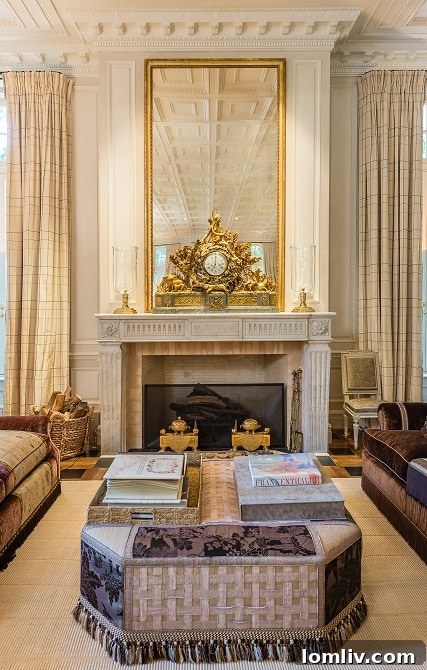 Hicks-Main-House-Living-Room-Fireplace1 - A detailed shot of the elegant fireplace in the Hicks Main House living room.