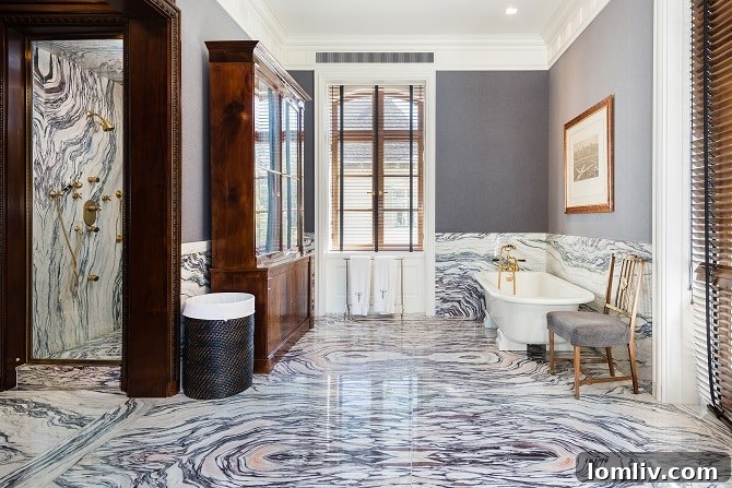 Hicks-Main-House-His-bath-in-Master-Suite - His refined bathroom in the master suite of the Hicks Main House, with book-matched marble.