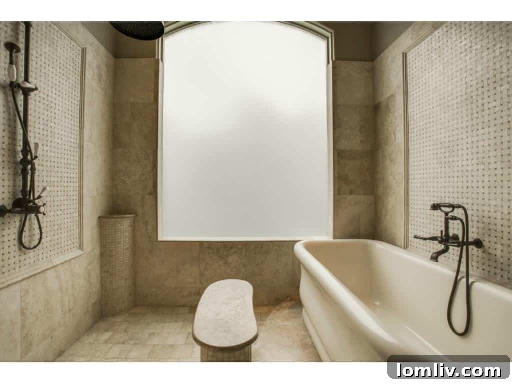 The lavish master bathroom at 4436 Brookview, featuring elegant finishes and a spa-like ambiance.