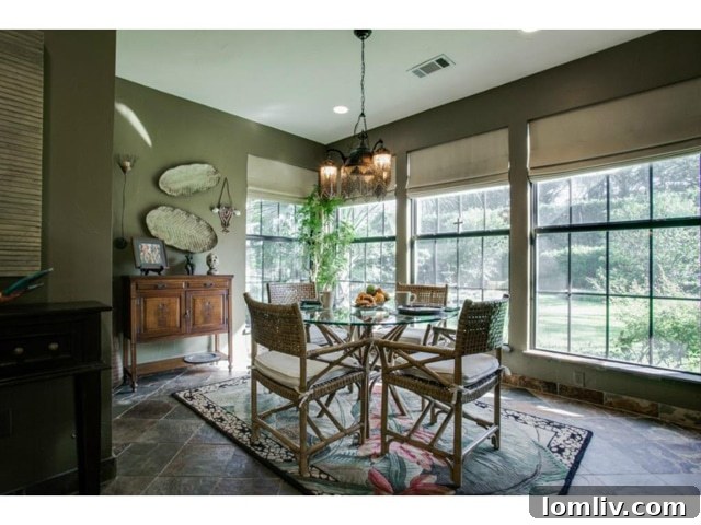 Bright Breakfast Nook with Arched Entry at 6701 Inwood