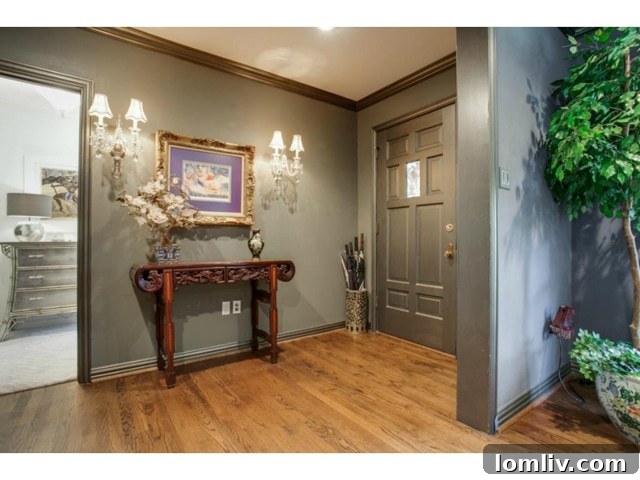 Elegant Foyer with Hardwood Floors at 6701 Inwood