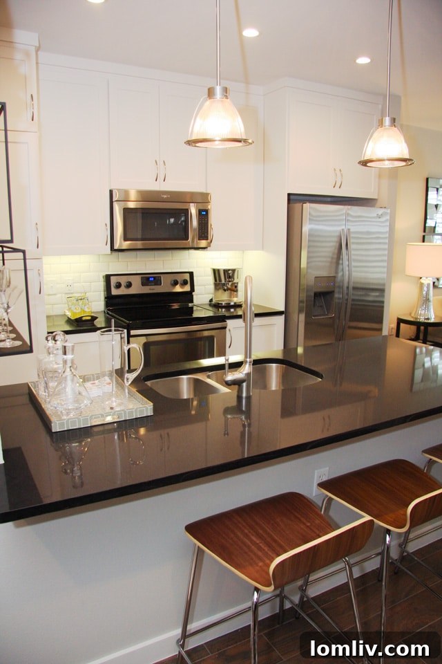 Contemporary kitchen design at Shelby Residences with quartz island