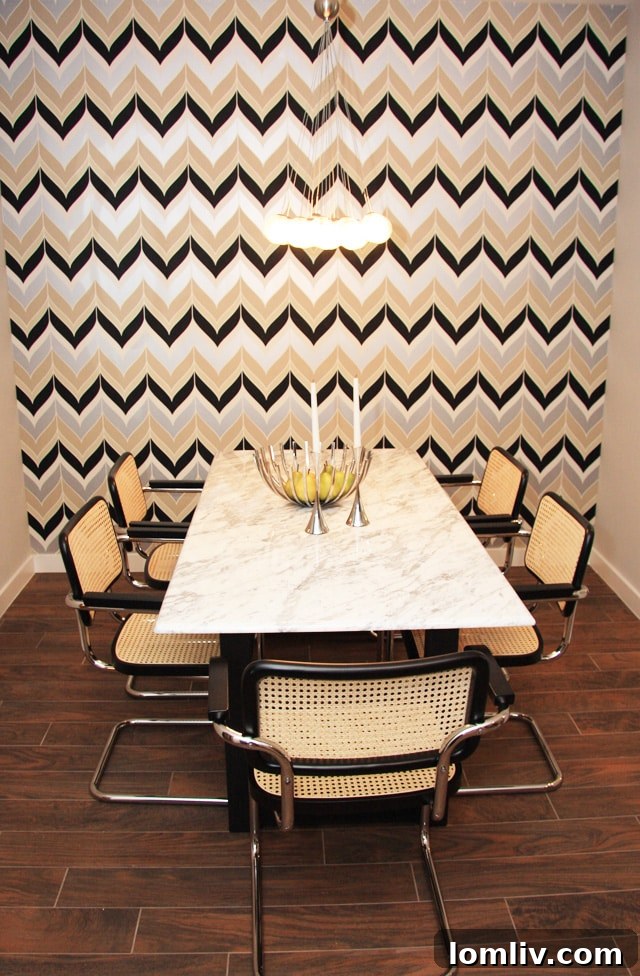 Stylish dining area in a Shelby Residences condo with modern art