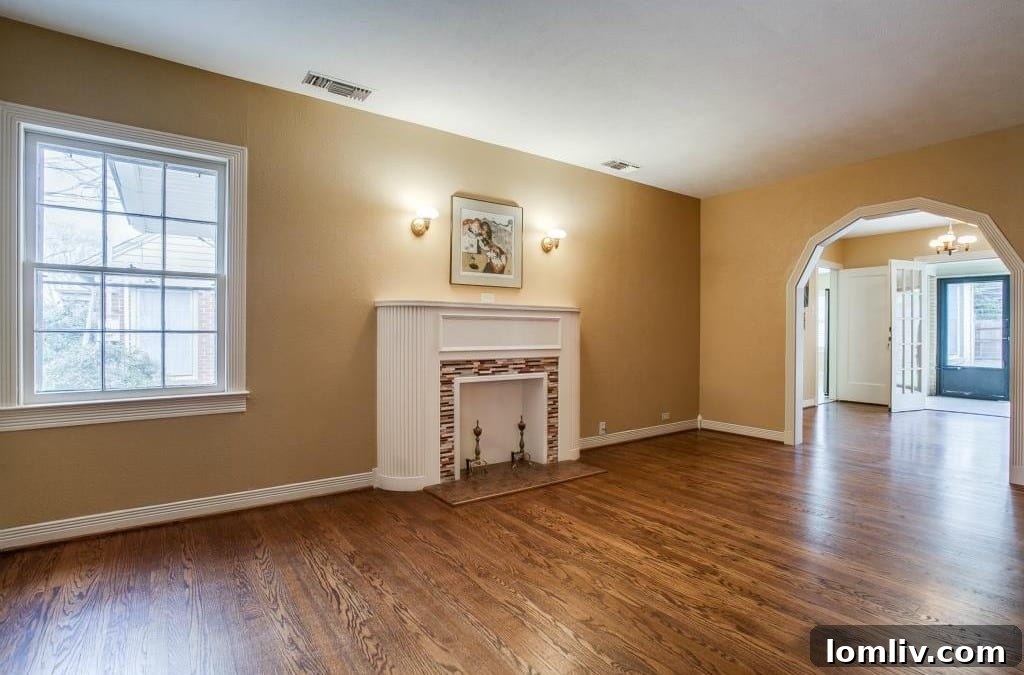 Living Room with Fireplace and Vintage Fixtures