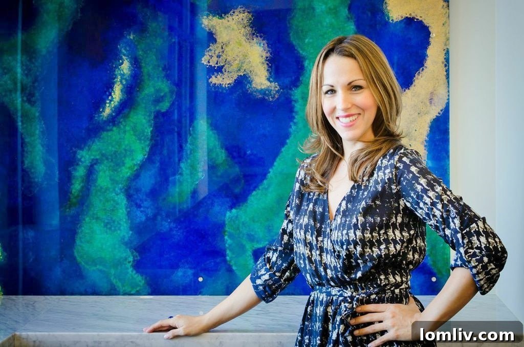 Jennifer Ayyad's vibrant acrylic painting, a functional art piece, graces the kitchen of Nathan Grace Real Estate's Frisco office. Photographed by Daniel Martinez of DM Photography.