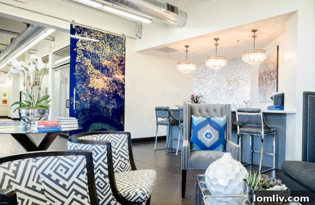 Jennifer Ayyad's vibrant large-scale acrylic sliding doors at the Nathan Grace Frisco office, a testament to modern functional art.