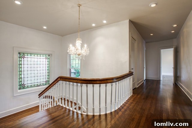 Beautiful stained glass window on the landing of 5803 Swiss Avenue, a non-original but charming addition by a previous owner