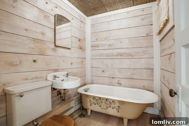 Spacious and bright attic studio with windows overlooking Swiss Avenue, ideal for an artist or media room