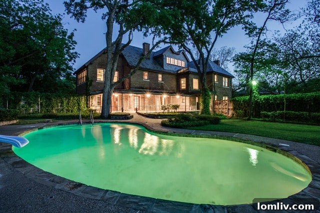 Spacious swimming pool and cabana with full bath at the historic Carrie Marcus Neiman home, ideal for leisure and hosting