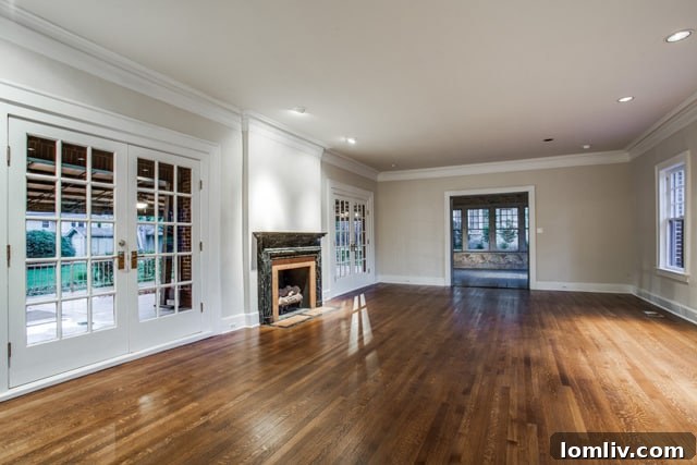 Bright formal living room at 5803 Swiss Avenue, showcasing elegant furnishings and natural light