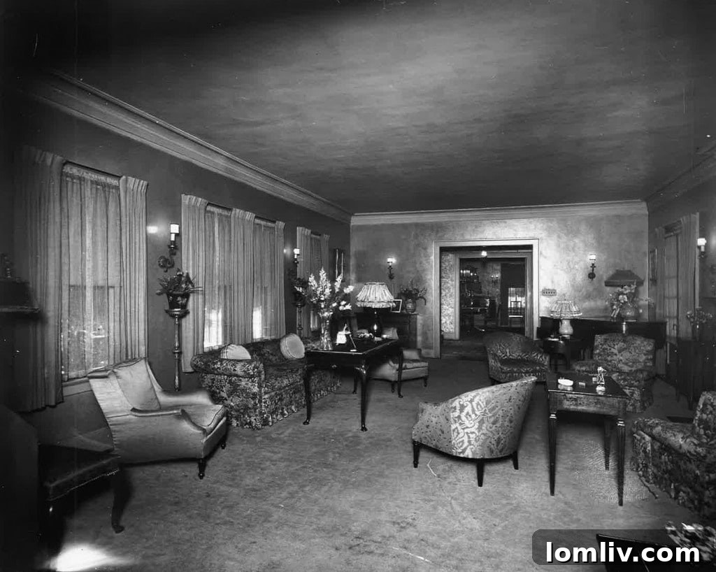Formal living room of Carrie Marcus Neiman's Dallas home, offering a view towards the foyer and formal dining room