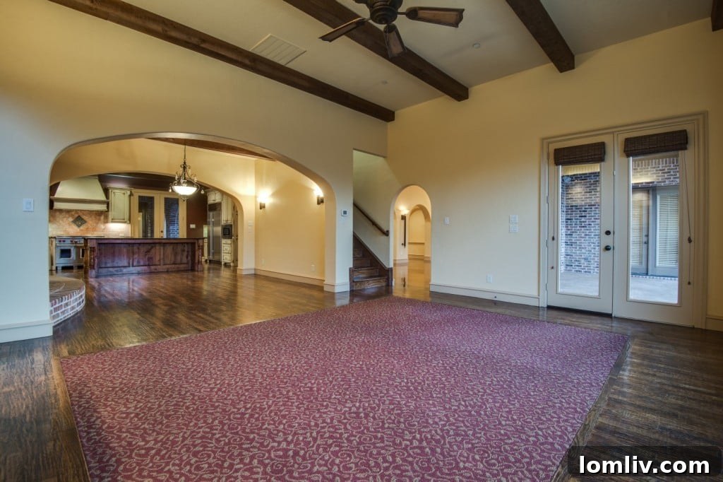 Family Room with Exposed Beams and Backyard Access, Luxury Allen Home