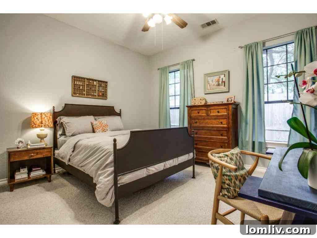 Bright and inviting secondary bedroom, suitable for guests or children, maintaining the home's classic style.