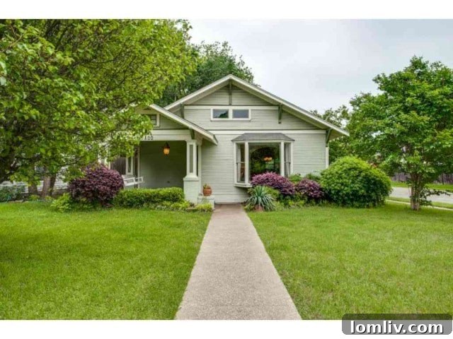 Front view of the historic 1926 Craftsman home at 5800 Palo Pinto, highlighting its well-maintained exterior and charming details.