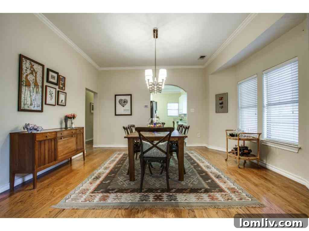 Another view of the spacious dining room, highlighting its connection to other living areas and ample natural light.