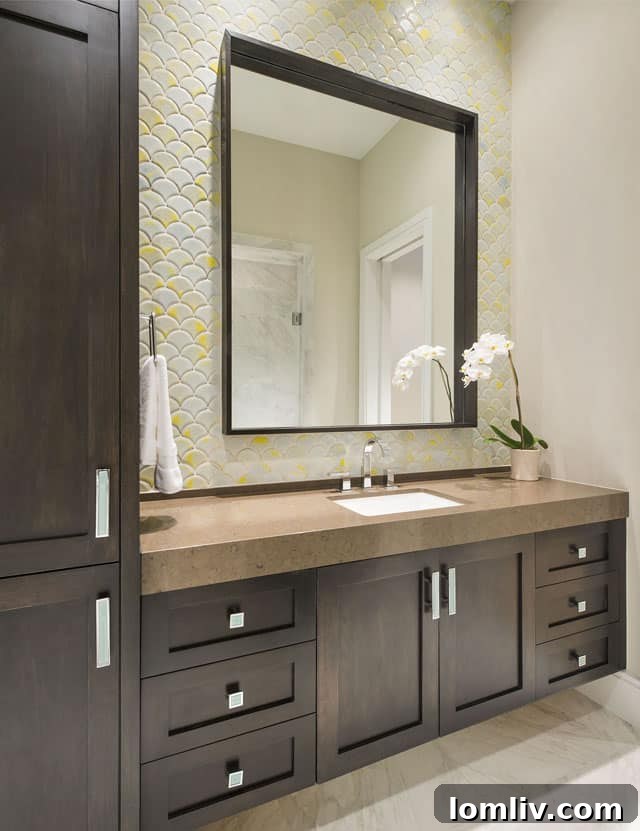 An elegantly furnished master bathroom or spa area in an Iris Hollow home, featuring luxurious marble finishes and high-end fixtures.