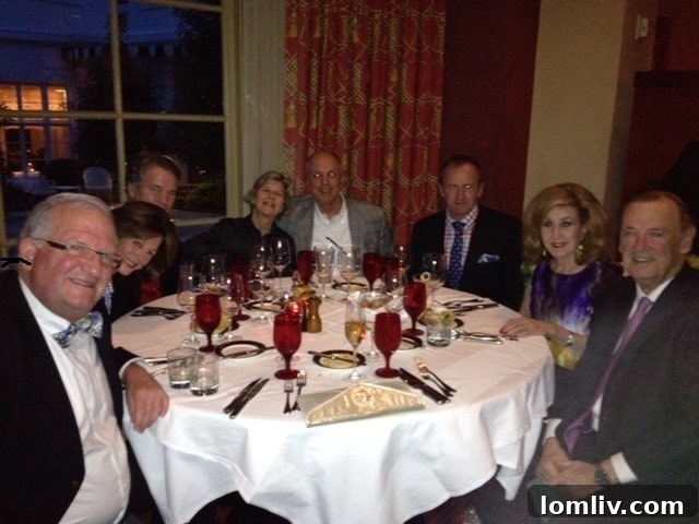 A group of people enjoying the luxurious ambiance of The Greenbrier, highlighting social aspects and elegance.