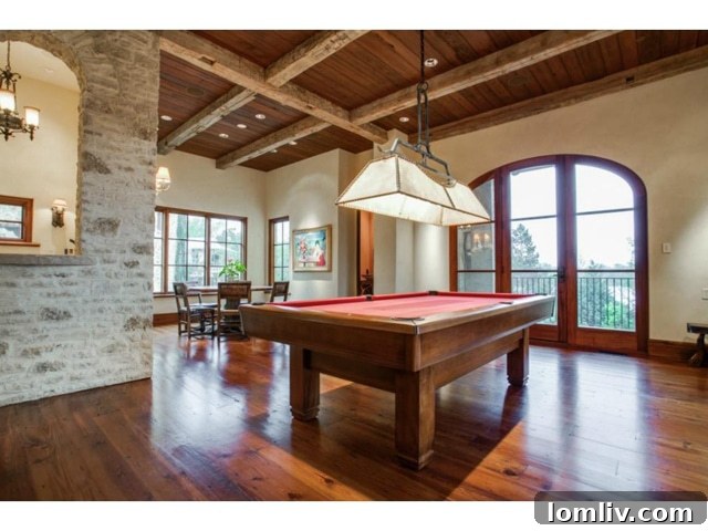 Spacious billiard room with ample natural light in Dallas luxury estate