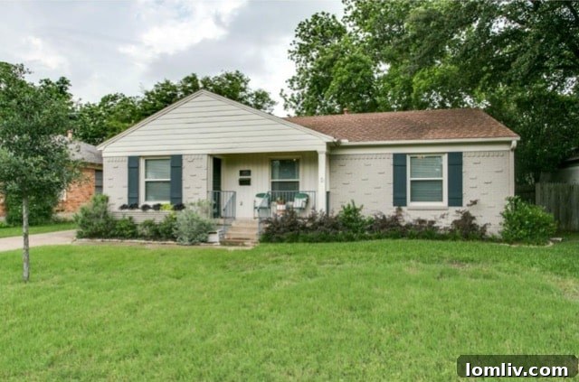 The stunning renovated exterior of 10229 Lynford Drive, a midcentury modern home in Dallas