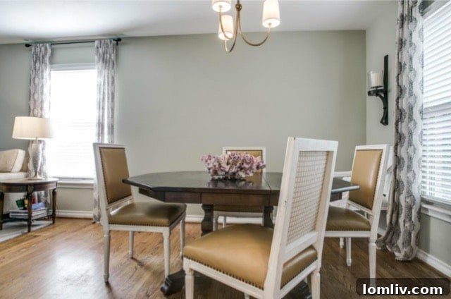 The dining table set for an elegant meal, reflecting the home's refined aesthetic