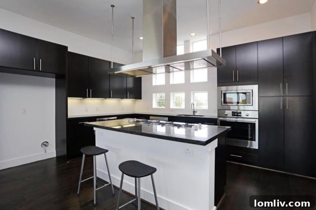 Sleek Kitchen Design with Custom Cabinetry - Hawthorne Townhomes
