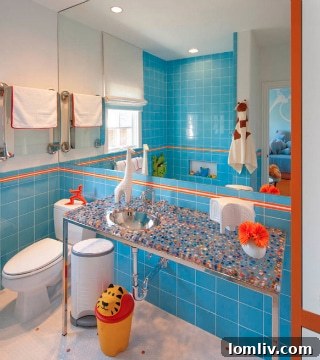 Avant-Garde Materials, Vibrant Spaces: Mary Anne Smiley's Interior Artistry 11 Mary Anne Smiley tarafından tasarlanan, parlak bir renk paletine sahip canlı ve eğlenceli erkek çocuk banyo iç mekanı