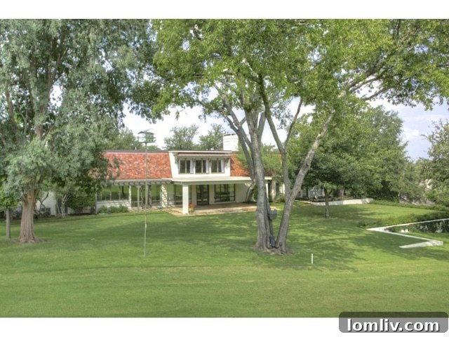 Panoramic view of the 8th fairway at Shady Oaks Golf Course from the backyard of 6224 Indian Creek Drive, Fort Worth.