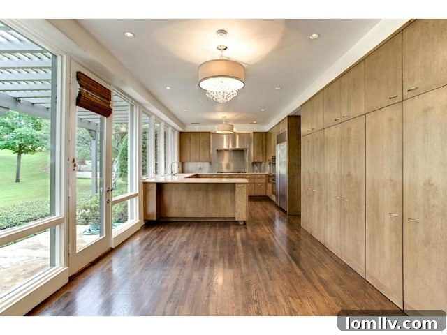Bright and inviting breakfast nook with golf course views, part of the gourmet kitchen at 6224 Indian Creek Drive.