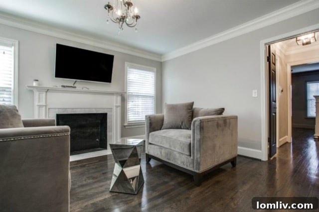 Elegant dining area with a delicate chandelier, perfect for entertaining guests at 5824 Palm Ln