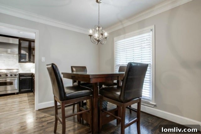 Inviting entryway with a glimpse into the open-concept living space and dining room at 5824 Palm Ln