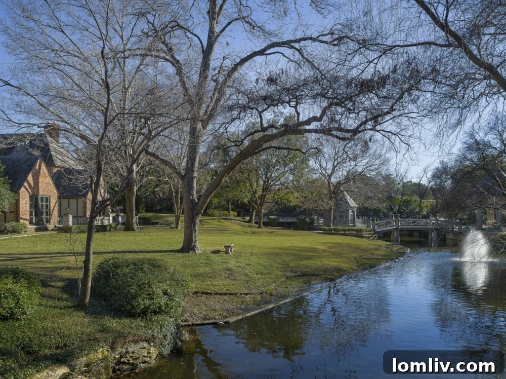 The serene lake view from 5505 Chatham Hill, part of its expansive 3.4-acre grounds.