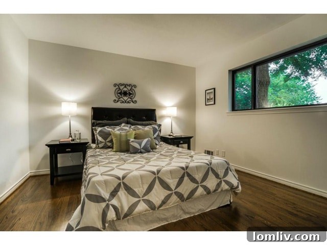 The serene master bedroom, a private retreat within the home.