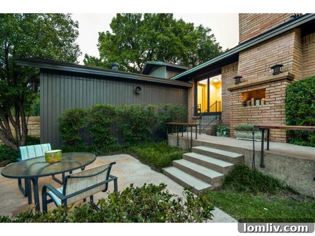 The expansive backyard with new decking, perfect for outdoor living and entertainment.