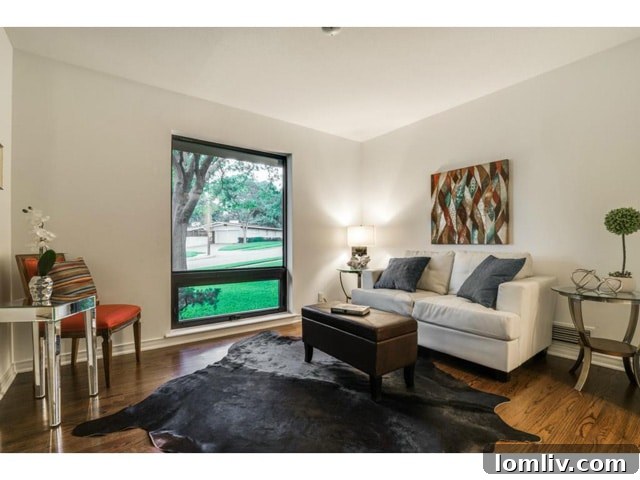 The formal living room, a bright and comfortable space with modern updates.