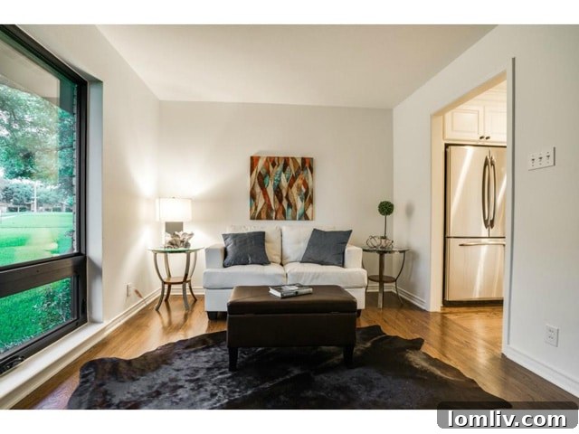 A different angle of the formal living area, emphasizing its inviting atmosphere.