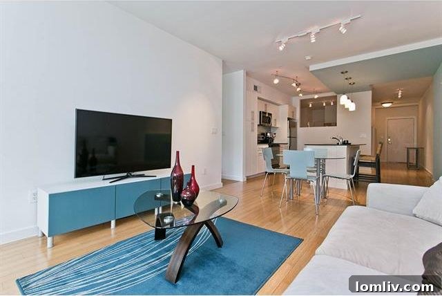 Cozy living space opening to a private balcony in The Haven Condos