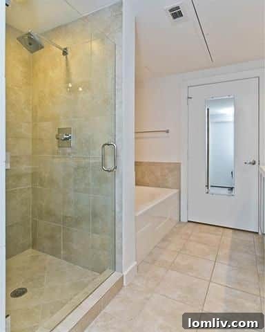 Spa-like master bathroom with garden tub and large glass shower