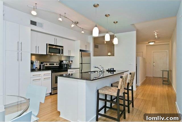 Gourmet kitchen with stainless steel appliances and large island breakfast bar