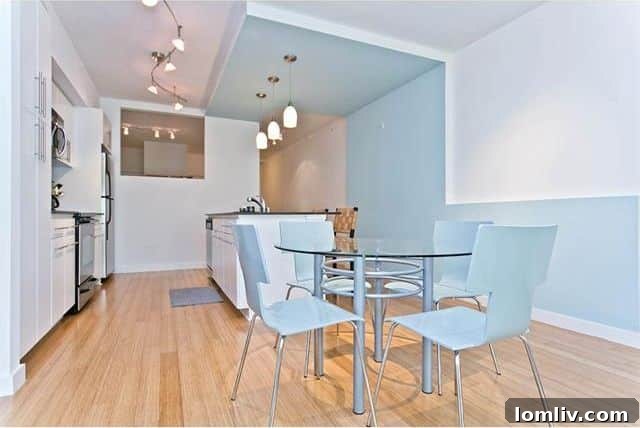 Bright breakfast area with ample space for dining table in modern condo