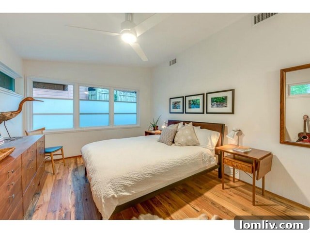 Master bedroom with natural light and views at 983 Sylvania