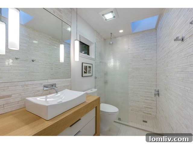 Luxurious master bathroom with contemporary design at 983 Sylvania