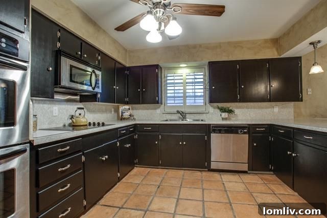 Elegant dining area with an open concept layout, flowing into the kitchen