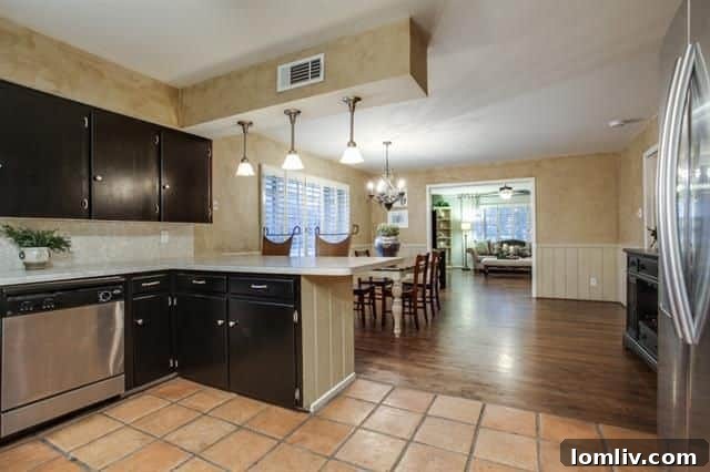 View of the open concept living and dining rooms with hardwood floors
