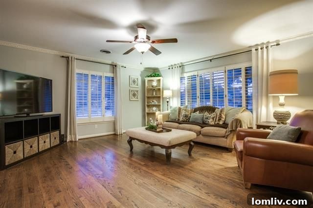 Charming mid-century residence at 703 Kirkwood Dr on a treed corner lot