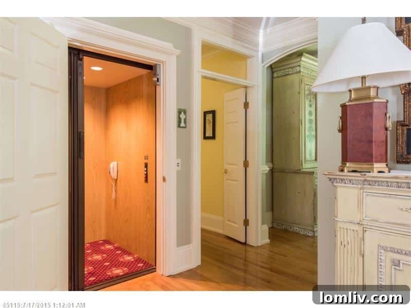 Bright and airy interior room with large windows at 2 Poets Lane.
