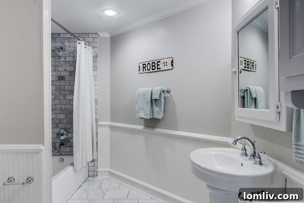 Bright and spacious bedroom, a perfect sanctuary within this historic home, featuring ample natural light