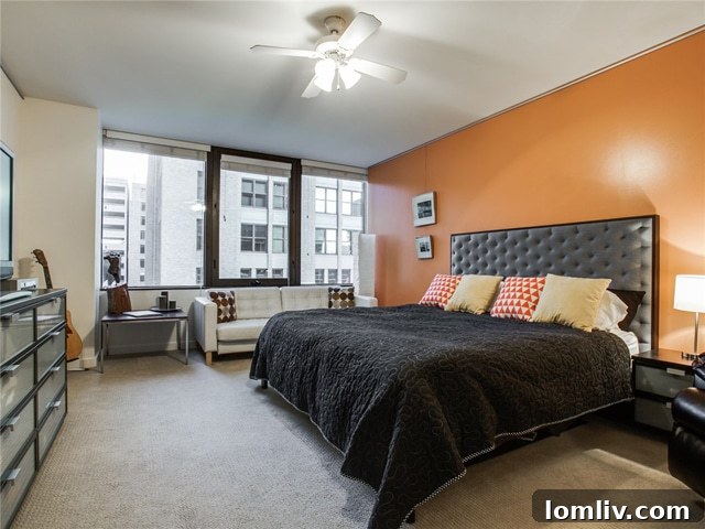 Elegant Master Bedroom with Expansive Windows in Dallas Condo